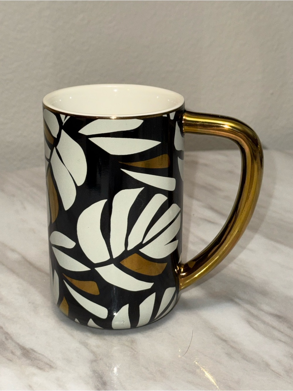 Tabitha Brown black white shiny gold plant leaves pattern gold handle